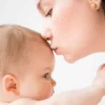 6 Rarely Known Dangers of Kissing Babies Carelessly